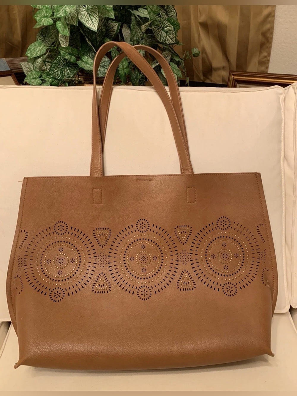 Madison West Brown Leather Tote Bag with Laser-Cut Medallion Design